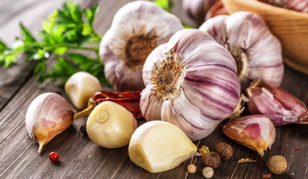 Adding Garlic to Your Meals by using a garlic grinder