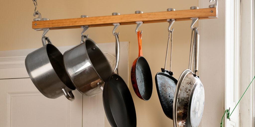 Pans and pots Hanging on Kitchen rack