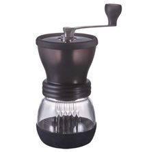 Image of the HARIO manual coffee grinder over a white background.