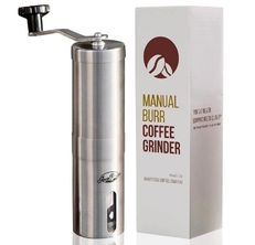 Silver Java Presse manual coffee grinder and its box on a white background.