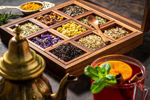 Wooden box of Tea and herbs including black tea, mallow, chamomile, fennel seeds, green tea, bancha tea, rooibos, field horsetail